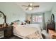 Inviting bedroom features a vaulted ceiling, ample natural light, and tasteful decor at 209 Crosswind Way, Las Vegas, NV 89145