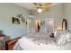 Spacious bedroom with vaulted ceiling, neutral paint, and access to ensuite bathroom at 209 Crosswind Way, Las Vegas, NV 89145