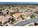 An aerial shot of many homes with desert landscaping and palm trees in a lovely neighborhood at 2606 Crested Butte St, Henderson, NV 89052