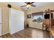Spare bedroom with a Murphy bed, wood floors, closet and natural light at 2606 Crested Butte St, Henderson, NV 89052