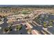 Aerial view of a community center with ample parking, landscaping, and community recreational areas at 2606 Crested Butte St, Henderson, NV 89052