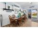Dining room featuring a wood table, chairs, and decorations with natural light at 2606 Crested Butte St, Henderson, NV 89052
