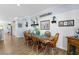 Comfortable dining room offering natural light, crown molding and wood floors at 2606 Crested Butte St, Henderson, NV 89052