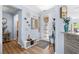 Inviting foyer with wood floors, an ornate front door, and modern accents at 2606 Crested Butte St, Henderson, NV 89052