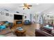Cozy living room with hardwood floors, comfortable seating, and natural light at 2606 Crested Butte St, Henderson, NV 89052