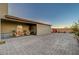 Spacious backyard featuring extensive brick pavers and a covered patio, perfect for outdoor entertaining and relaxation at 2669 Via Monet, Henderson, NV 89044