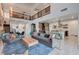 Bright and airy open-concept living area with loft, modern furnishings, and seamless flow to the kitchen at 2669 Via Monet, Henderson, NV 89044