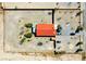 High angle on property with its enclosed yard and desert surroundings, with several cars parked at 2801 Peggy Ave, Pahrump, NV 89048