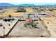 Idyllic neighborhood setting featuring a neatly kept home with a vibrant red roof and spacious surroundings at 2801 Peggy Ave, Pahrump, NV 89048