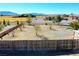 Spacious backyard with desert landscaping and fenced perimeter at 2801 Peggy Ave, Pahrump, NV 89048