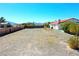 Expansive backyard with secure fencing, suitable for various outdoor uses at 2801 Peggy Ave, Pahrump, NV 89048