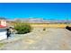 Scenic backyard view featuring open space with a patio and mountain backdrop at 2801 Peggy Ave, Pahrump, NV 89048