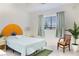 Bright bedroom with neutral tones, featuring a comfortable bed and window at 2801 Peggy Ave, Pahrump, NV 89048