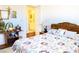 Cozy bedroom featuring a comfortable bed, a wooden nightstand, and an ensuite bathroom at 2801 Peggy Ave, Pahrump, NV 89048