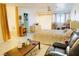 Spacious bedroom with a sitting area, closet, and large windows for natural light at 2801 Peggy Ave, Pahrump, NV 89048