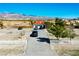 Expansive desert property with a charming home, mature trees, and snow-capped mountain views at 2801 Peggy Ave, Pahrump, NV 89048
