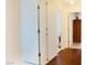 Well-maintained hallway with hardwood flooring and built-in storage cabinets at 2801 Peggy Ave, Pahrump, NV 89048