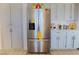 Well-organized kitchen with stainless steel refrigerator and plentiful cabinet space at 2801 Peggy Ave, Pahrump, NV 89048