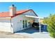 Rear exterior view featuring covered patio and outdoor seating area at 2801 Peggy Ave, Pahrump, NV 89048