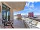 Stylish balcony with seating, offering panoramic city views and a peaceful outdoor escape in a luxurious setting at 2877 Paradise Rd # 2704, Las Vegas, NV 89109