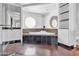 Modern bathroom with a stylish tub, sleek fixtures, and unique round window at 2877 Paradise Rd # 2704, Las Vegas, NV 89109
