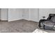 Spacious carpeted bedroom highlighting a luxury massage chair and a calming ambiance at 2877 Paradise Rd # 2704, Las Vegas, NV 89109