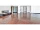 Spacious living room with hardwood floors, large windows, and light walls, offering a bright and inviting atmosphere at 2877 Paradise Rd # 2704, Las Vegas, NV 89109