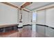 Living room featuring light walls, dark trim, and floor-to-ceiling windows with stunning city views at 2877 Paradise Rd # 2704, Las Vegas, NV 89109
