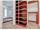 Spacious walk-in closet with custom shelves and carpeted flooring at 2877 Paradise Rd # 2704, Las Vegas, NV 89109