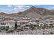 Beautifully landscaped home with pool and backyard situated near scenic mountain views at 3000 Raywood Ash Dr, Las Vegas, NV 89138