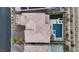 Stunning aerial view of a home with a private pool and landscaped backyard at 3000 Raywood Ash Dr, Las Vegas, NV 89138