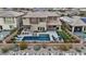 Beautiful home with a sparkling pool, well-manicured lawn, and inviting outdoor living spaces at 3000 Raywood Ash Dr, Las Vegas, NV 89138