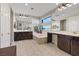 Well-lit bathroom featuring double vanities, a soaking tub, and a glass-enclosed shower at 3000 Raywood Ash Dr, Las Vegas, NV 89138