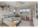 Spacious bedroom featuring bright lighting, hardwood floors, and stylish decor at 3000 Raywood Ash Dr, Las Vegas, NV 89138