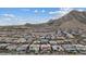 Beautiful neighborhood view showcasing a Primary-planned community against a mountain backdrop at 3000 Raywood Ash Dr, Las Vegas, NV 89138