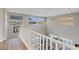 Bright and airy foyer with mountain views, hardwood floors, and stylish staircase at 3000 Raywood Ash Dr, Las Vegas, NV 89138