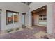 Charming front entrance features a brick walkway, stylish exterior lighting, and a welcoming front door at 3000 Raywood Ash Dr, Las Vegas, NV 89138