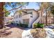 Condominium exterior featuring well-kept landscaping and easy access to the upper floors at 3123 Key Largo Dr # 101, Las Vegas, NV 89120