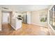 Bright kitchen features stainless steel appliances and tile flooring leading to dining area at 3123 Key Largo Dr # 101, Las Vegas, NV 89120