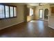 Bright living room showcasing wood-style flooring, natural light, and an open layout at 340 Manti Pl # 0, Henderson, NV 89014