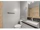 Neutral bathroom featuring a granite countertop, toilet, and updated shower at 3910 W Pebble Rd, Las Vegas, NV 89139