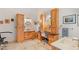 Bathroom with custom wood cabinetry, dual sinks, and a vanity area at 3910 W Pebble Rd, Las Vegas, NV 89139