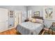 Cozy bedroom with natural light from shuttered windows, featuring a comfortable queen-size bed at 3910 W Pebble Rd, Las Vegas, NV 89139