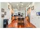 Spacious kitchen with wood cabinets and island, stainless steel appliances, and hardwood flooring at 3910 W Pebble Rd, Las Vegas, NV 89139