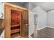 Home sauna features glass door entry, wood-paneled interior, and integrated lighting at 3910 W Pebble Rd, Las Vegas, NV 89139