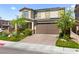 Beautiful two-story home featuring desert landscaping and a two car garage at 4352 Browns Creek Ave, North Las Vegas, NV 89084