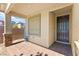 Inviting front porch with stylish brick flooring and a view of the neighborhood at 4352 Browns Creek Ave, North Las Vegas, NV 89084