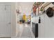 Hallway with decorative wall art, neutral walls, and access to the living area at 4352 Browns Creek Ave, North Las Vegas, NV 89084