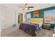 Comfortable bedroom with carpet flooring, ensuite bath and bright natural light at 4352 Browns Creek Ave, North Las Vegas, NV 89084
