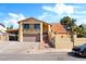 Charming home with a tile roof, two-car garage and welcoming entrance at 4360 Flandes St, Las Vegas, NV 89121